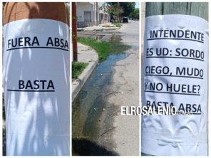 Hartos de los desbordes cloacales vecinos pegan carteles contra ABSA y el intendente